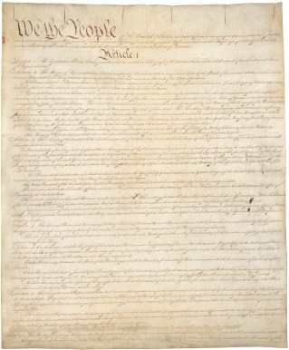 Constitution of the United States, first page of the original, provided by the National Archives and Records Administration, public domain via Wikimedia Commons