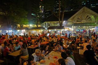 Singapore, Satay stalls along Boon Tat Street next to Telok Ayer Market by Allie Caulfield, Public Domain via Wikimedia Commons