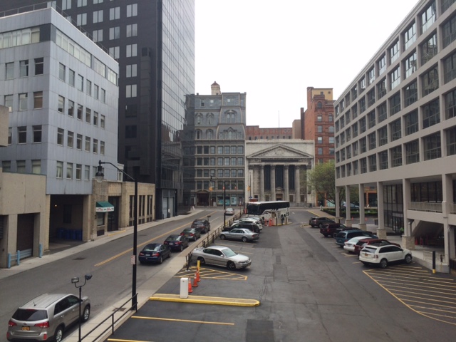 View from west end of Corinthian St, showing site of old Corinthian Hall at right where the glassy midcentury building now stands, photo 2016 by Paige Sloan