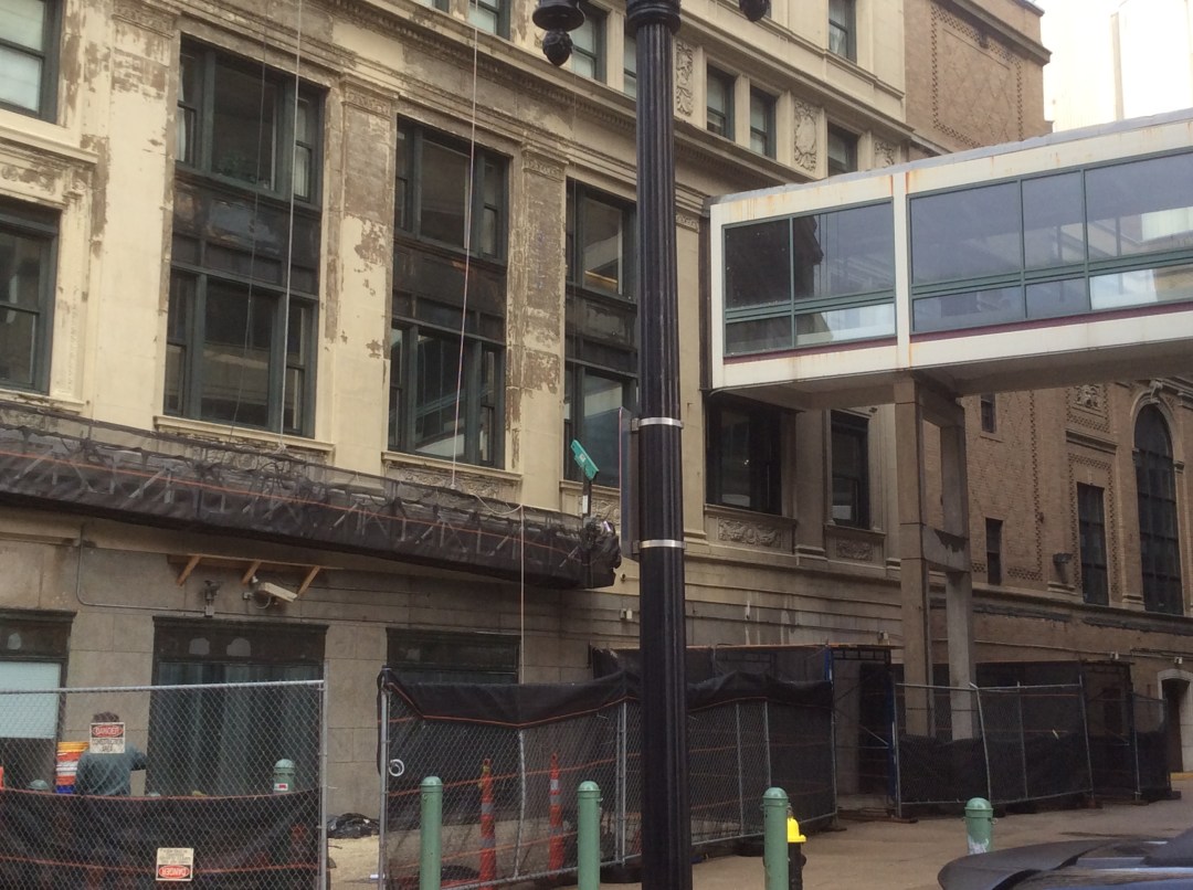 Wang Theater on Tremont St, side facing alley, showing contrast between marble front and brick back sections of the building