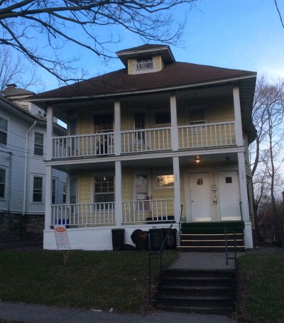 Yellow house I stay at in Syracuse, NY, photo 2016 by Amy Cools