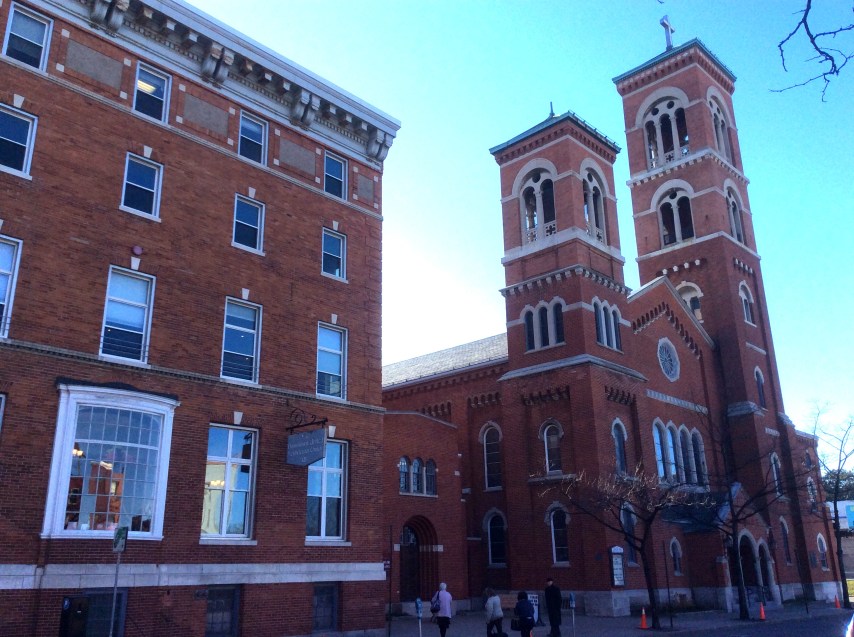 Downtown United Presbyterian Church and adjoining hall with 1848 Rochester Women's Rights Convention commemorative plaque. The sun was sinking low behind the church when I took this photo