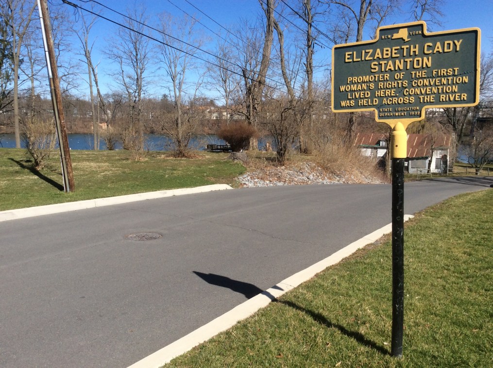 Elizabeth Cady Stanton house historical marker, with the Seneca River in the background