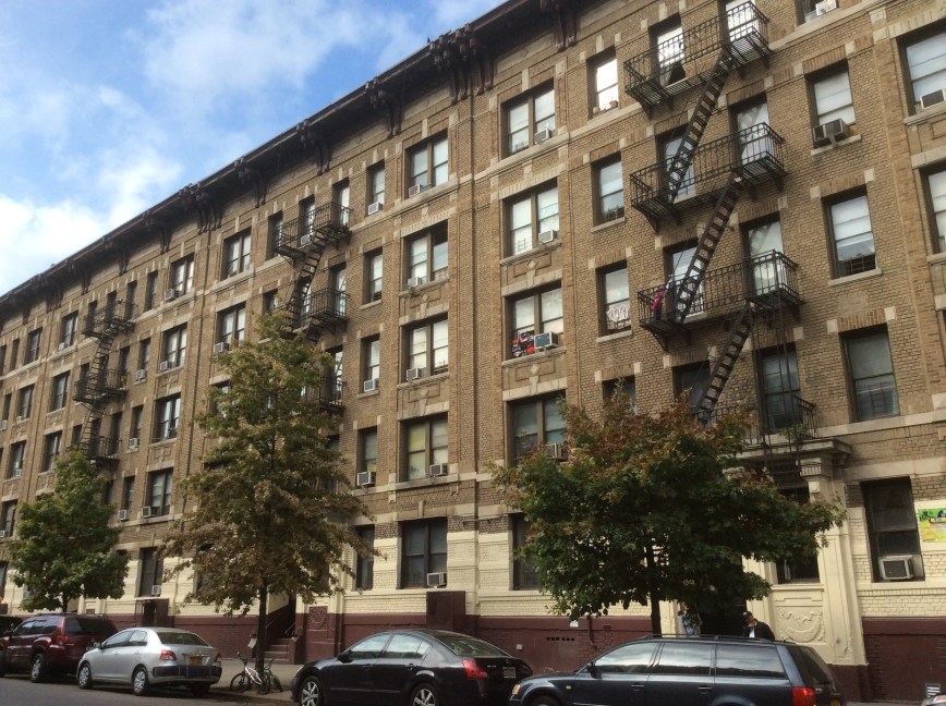 Apartment buildings which include 34 Post Ave near Dyckman St, NYC, 2016 by Amy Cools