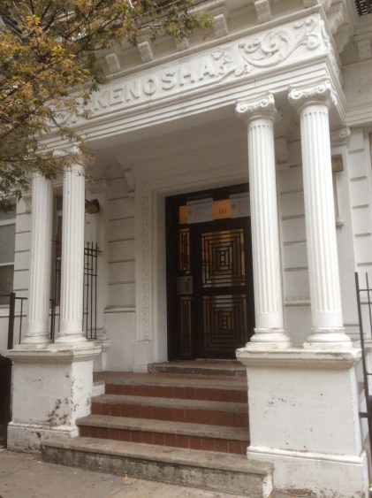 Porch of the Kenosha building at 141 W. 111th St, Harlem, NYC